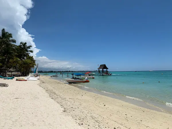 The calm beach at Trou aux Biches
